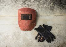 Schweißerkleidung - Schild und Handschuhe